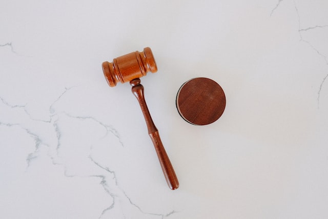 wooden gavel and mat